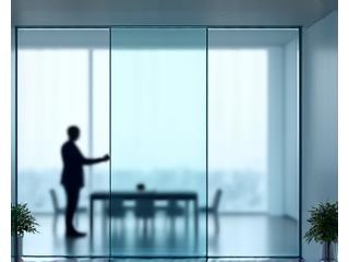 Liquid crystal glass panel showing a seamless transition between opaque privacy mode and clear visibility